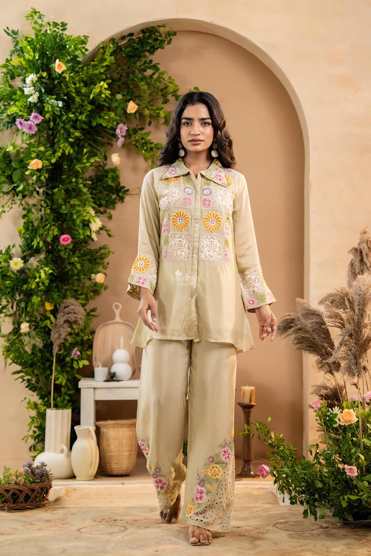 Woman in a beige embroidered co-ord set