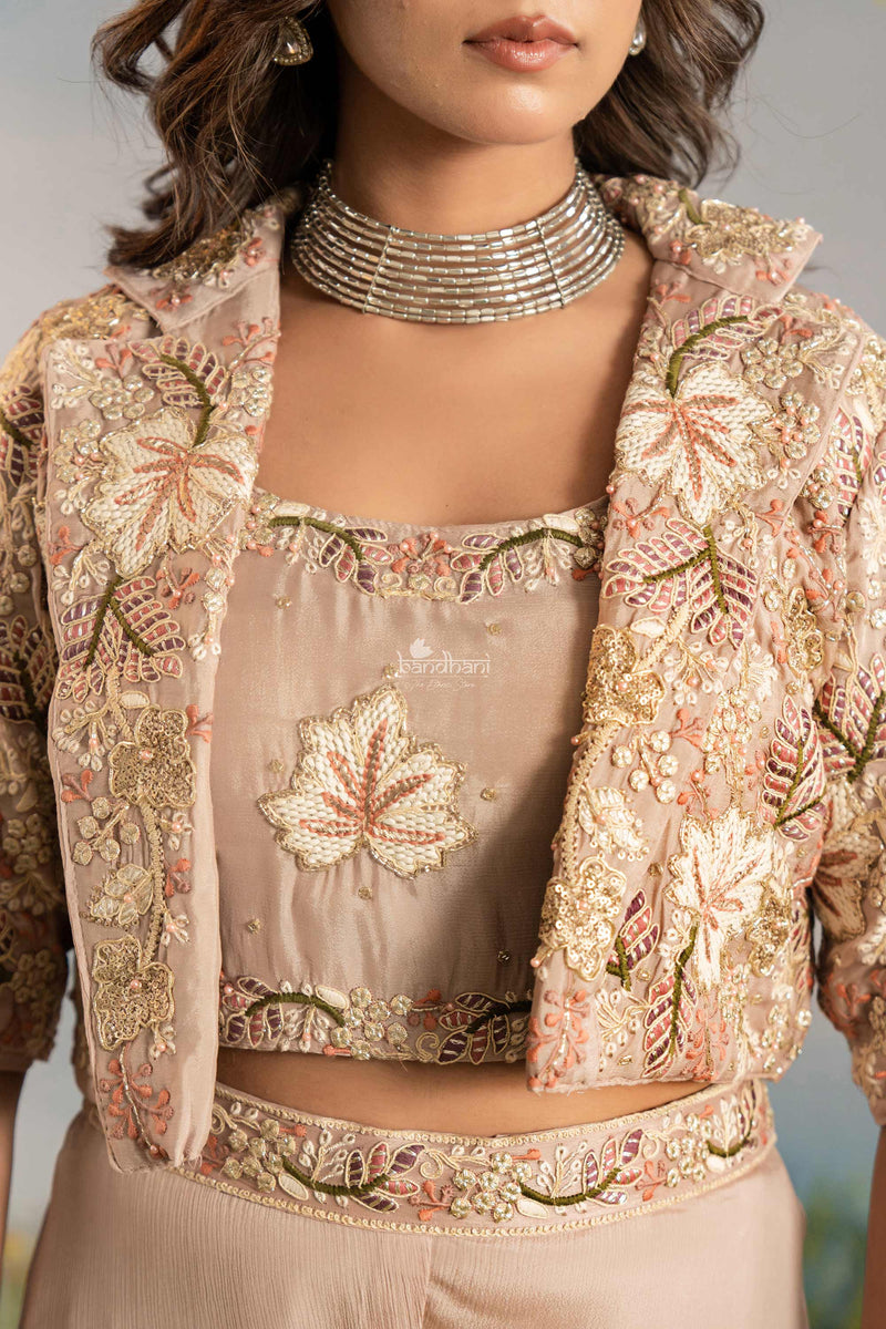 Traditional embroidered blouse with floral patterns on a neutral background