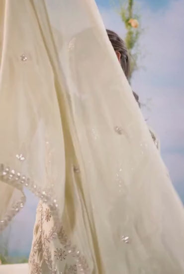 Women wear kurti set in cream color